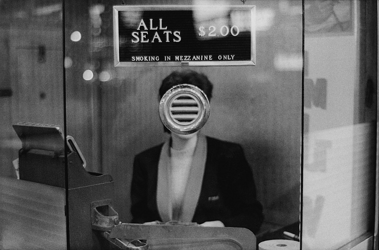 Joel Meyerowitz, Movie Theater Booth, Times Square, New York City, 1963. Courtesy of the artist and Howard Greenberg Gallery.  Rencontres Arles.