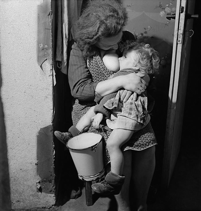 Werner Bischof, A mother breastfeeding her child as long as possible, to save him from malnutrition, Bonn, Germany, 1946.  Werner Bischof/Magnum Photos