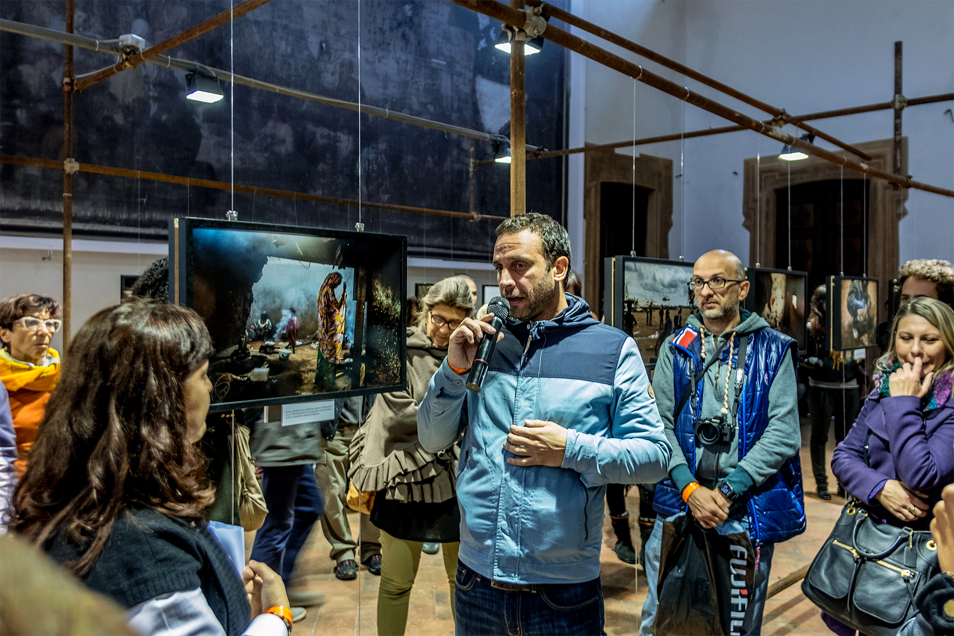 William Daniels during the guided tour of his exhibition C.A.R., set up at Palazzo Barni in Lodi.  FPmag.