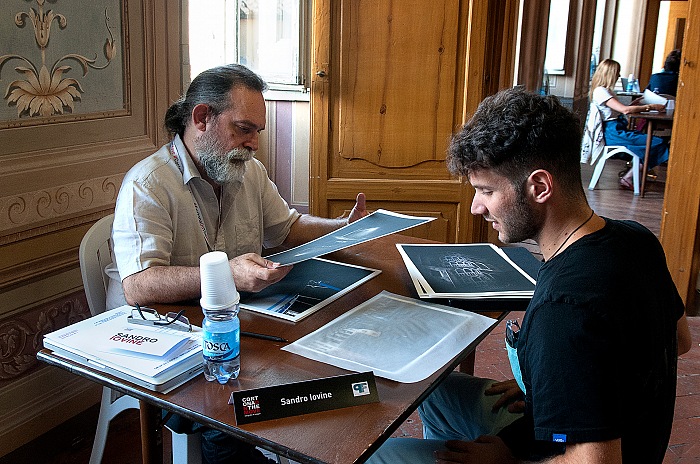 Sandro Iovine, director of FPmag, during the Portfolio reviews organized within Cortona On The Move 2016.  Stefania Biamonti/FPmag.