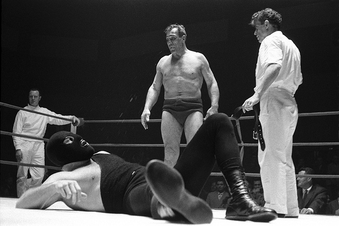 Evaristo Fusar, Primo Carnra abbatte l'Uomo Mascherato, Parigi,1960, dalla mostra Evaristo Fusar. Primo Carnera.  Evaristo Fuser.