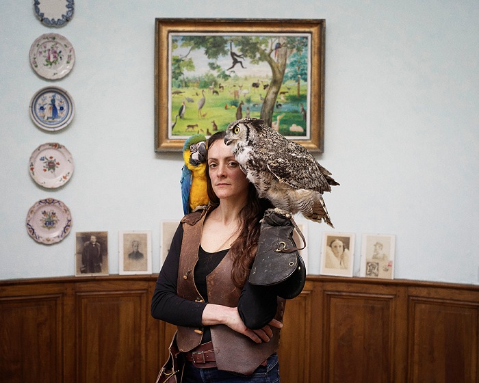 Ed Alcock - CDT 56, Aurlie Forges, fauconnire au Parc zoologique du chteau de Branfr  Le Guerno. From the series Entre chien et loup Petites fables du Morbihan.  Ed Alcock - CDT 56 / Agence Myop pour Le Festival Photo La Gacilly 2017